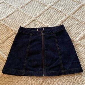 Jean skirt with a zipper down the middle. Size small.